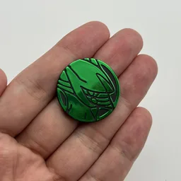 In hand, from Pokémon Coin Fan, full size