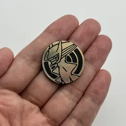In hand, from Pokémon Coin Fan, full size