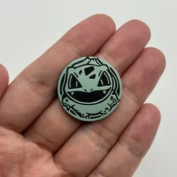In hand, from Pokémon Coin Fan, full size
