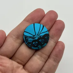 In hand, from Pokémon Coin Fan, full size
