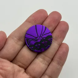 In hand, from Pokémon Coin Fan, full size