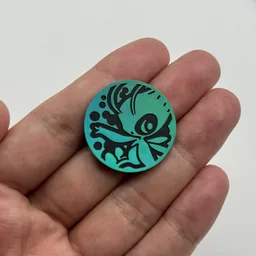 In hand, from Pokémon Coin Fan, full size