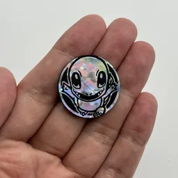 In hand, from Pokémon Coin Fan, full size