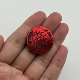 In hand, from Pokémon Coin Fan, full size