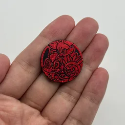 In hand, from Pokémon Coin Fan, full size