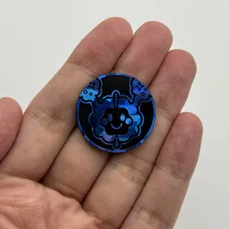In hand, from Pokémon Coin Fan, full size