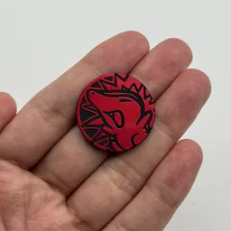 In hand, from Pokémon Coin Fan, full size