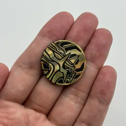In hand, from Pokémon Coin Fan, full size