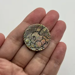 In hand, from Pokémon Coin Fan, full size