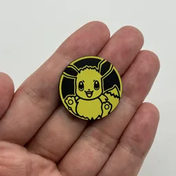 In hand, from Pokémon Coin Fan, full size