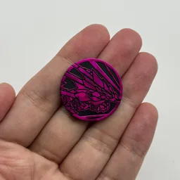 In hand, from Pokémon Coin Fan, full size