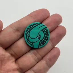 In hand, from Pokémon Coin Fan, full size
