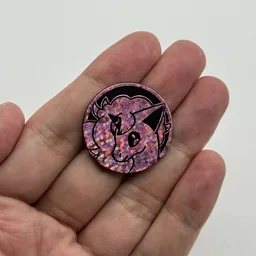 In hand, from Pokémon Coin Fan, full size
