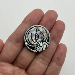 In hand, from Pokémon Coin Fan, full size