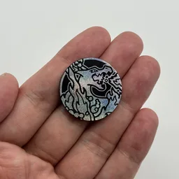 In hand, from Pokémon Coin Fan, full size