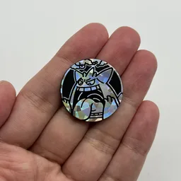 In hand, from Pokémon Coin Fan, full size