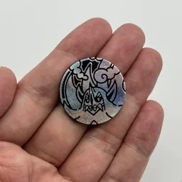 In hand, from Pokémon Coin Fan, full size