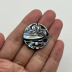 In hand, from Pokémon Coin Fan, full size