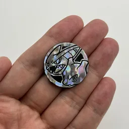 In hand, from Pokémon Coin Fan, full size