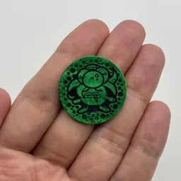 In hand, from Pokémon Coin Fan, full size