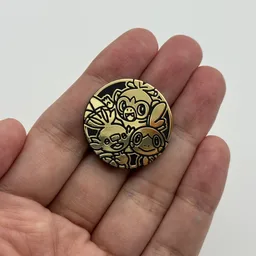 In hand, from Pokémon Coin Fan, full size