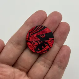 In hand, from Pokémon Coin Fan, full size