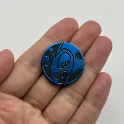 In hand, from Pokémon Coin Fan, full size
