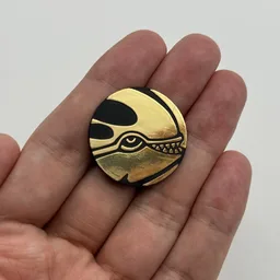 In hand, from Pokémon Coin Fan, full size