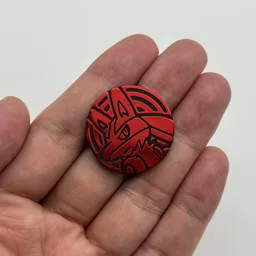 In hand, from Pokémon Coin Fan, full size