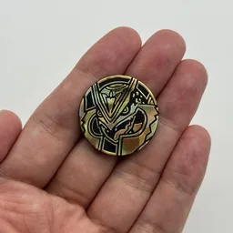In hand, from Pokémon Coin Fan, full size