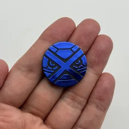 In hand, from Pokémon Coin Fan, full size