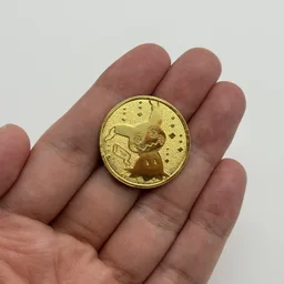 In hand, from Pokémon Coin Fan, full size