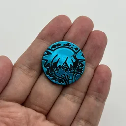 In hand, from Pokémon Coin Fan, full size