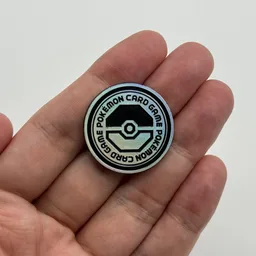 In hand, from Pokémon Coin Fan, full size