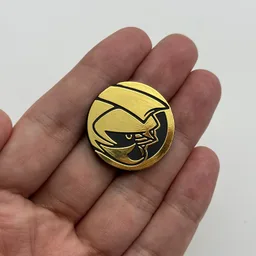 In hand, from Pokémon Coin Fan, full size