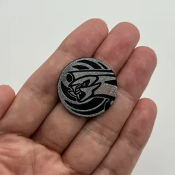In hand, from Pokémon Coin Fan, full size