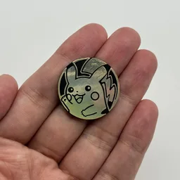 In hand, from Pokémon Coin Fan, full size