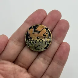 In hand, from Pokémon Coin Fan, full size