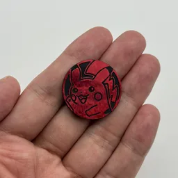 In hand, from Pokémon Coin Fan, full size
