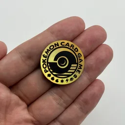 In hand, from Pokémon Coin Fan, full size