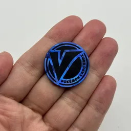 In hand, from Pokémon Coin Fan, full size