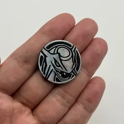 In hand, from Pokémon Coin Fan, full size