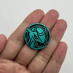 In hand, from Pokémon Coin Fan, full size