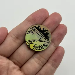 In hand, from Pokémon Coin Fan, full size
