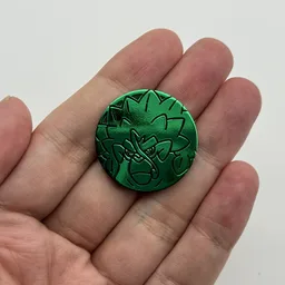In hand, from Pokémon Coin Fan, full size