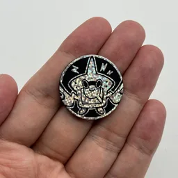 In hand, from Pokémon Coin Fan, full size
