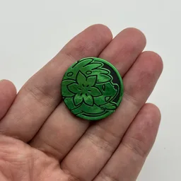 In hand, from Pokémon Coin Fan, full size