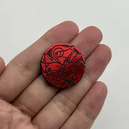 In hand, from Pokémon Coin Fan, full size
