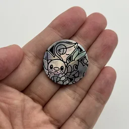 In hand, from Pokémon Coin Fan, full size