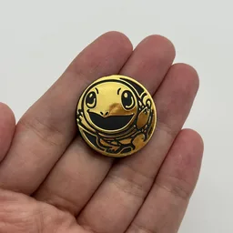 In hand, from Pokémon Coin Fan, full size